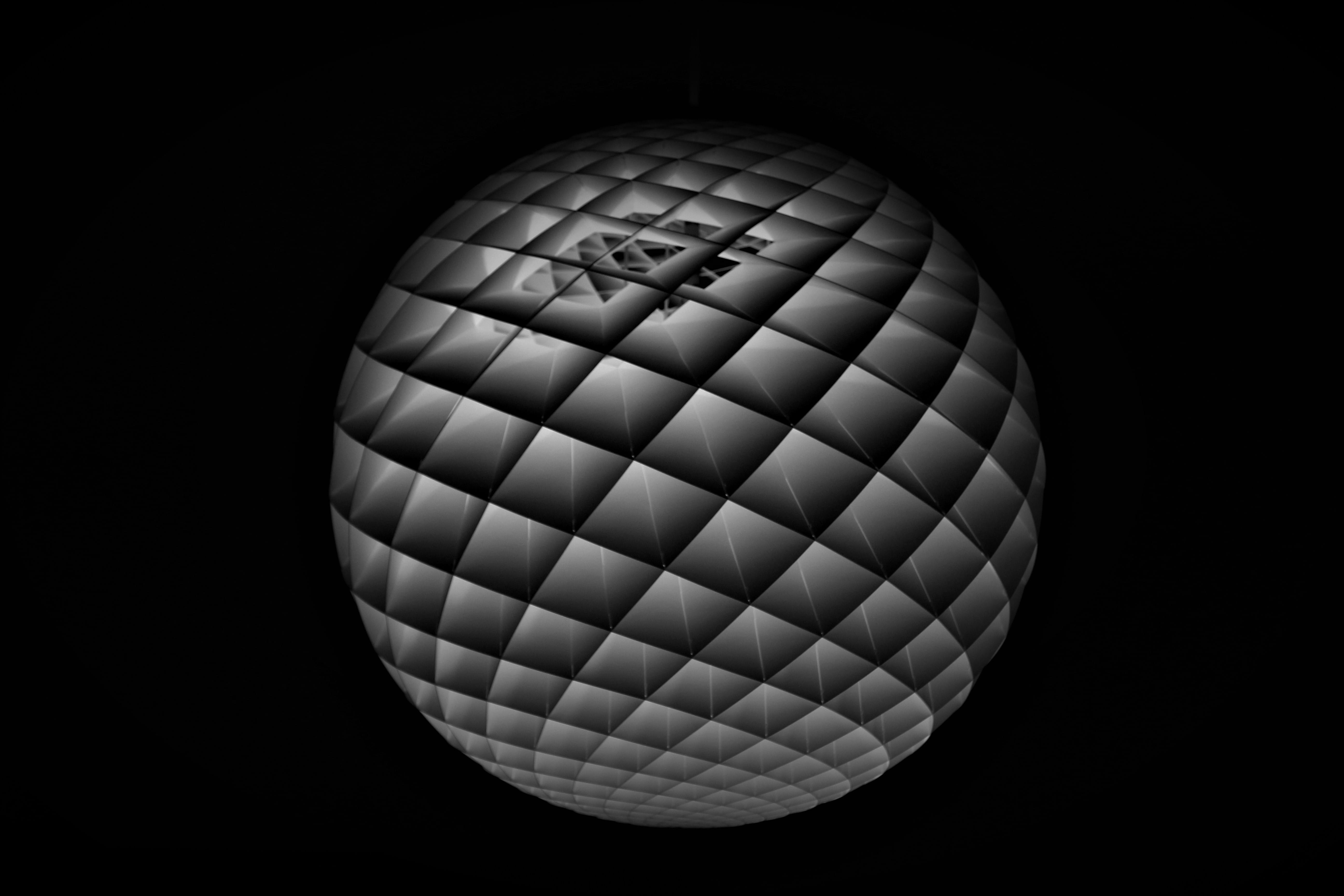 black background, indoors, studio shot, pattern, close-up, shape