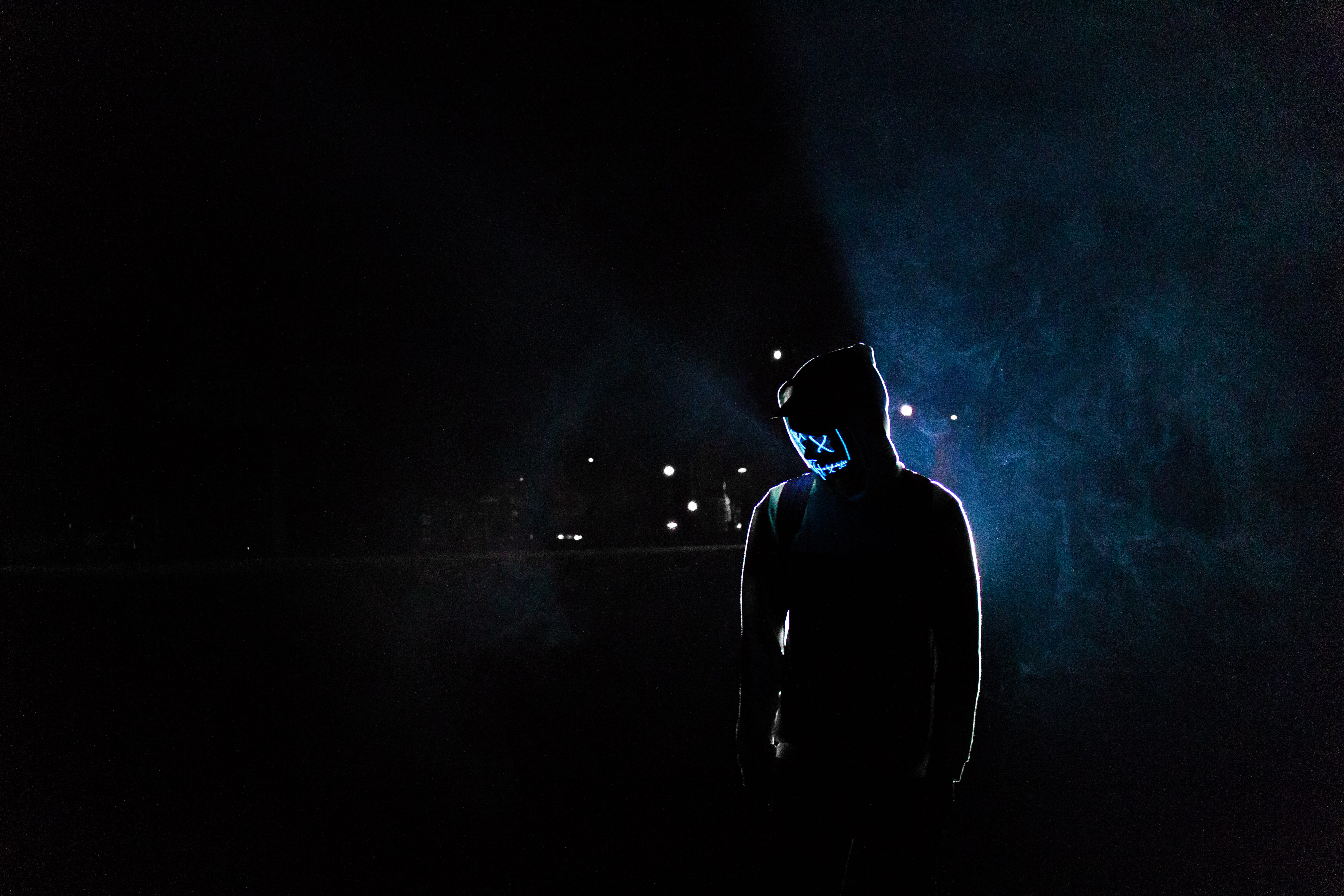 Man in Mask, backlit, bokeh, cap, colors, colours, dark, darkness