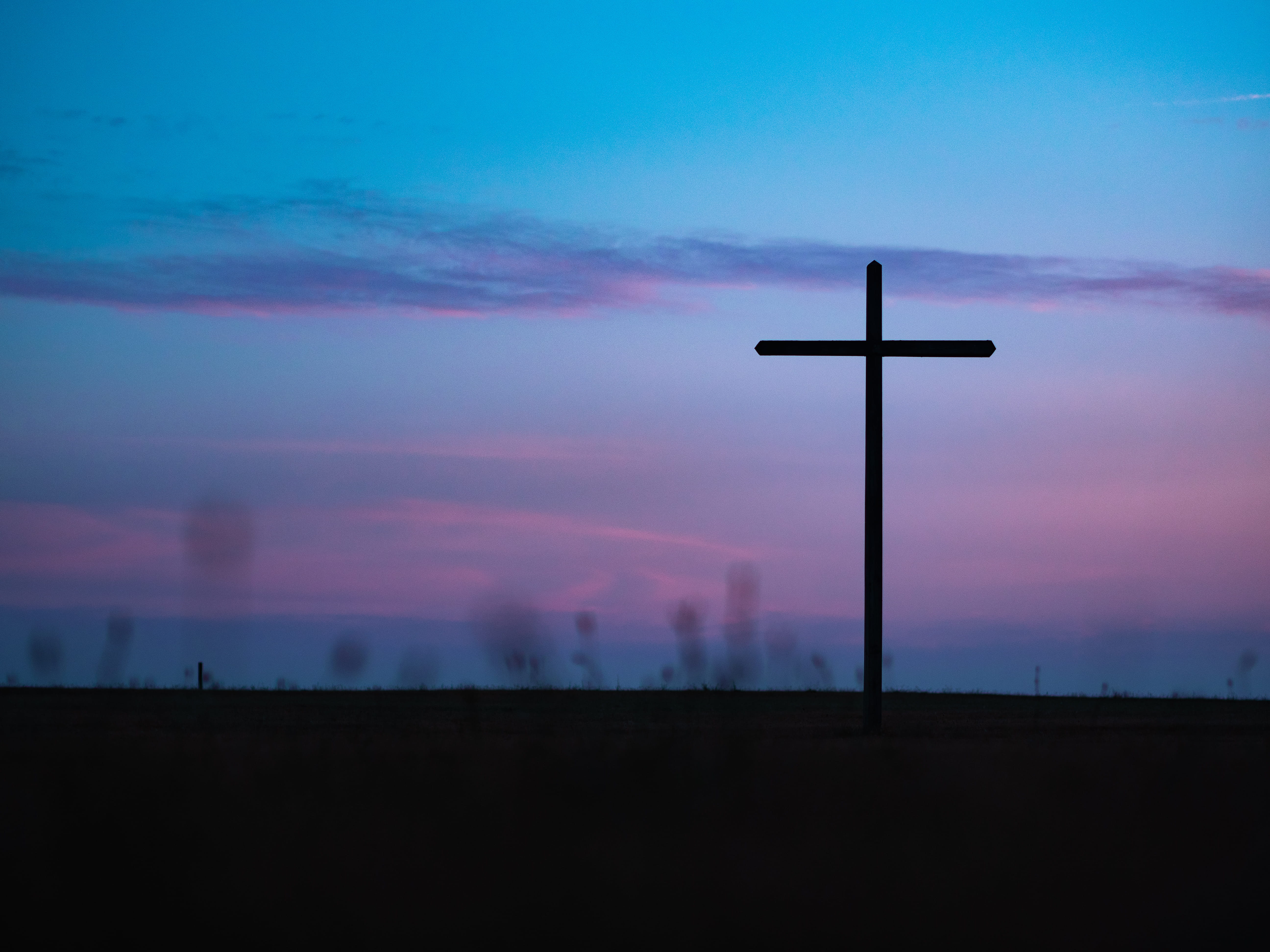 cross stand under purple and blue sky, horizon, silhouette, sunset