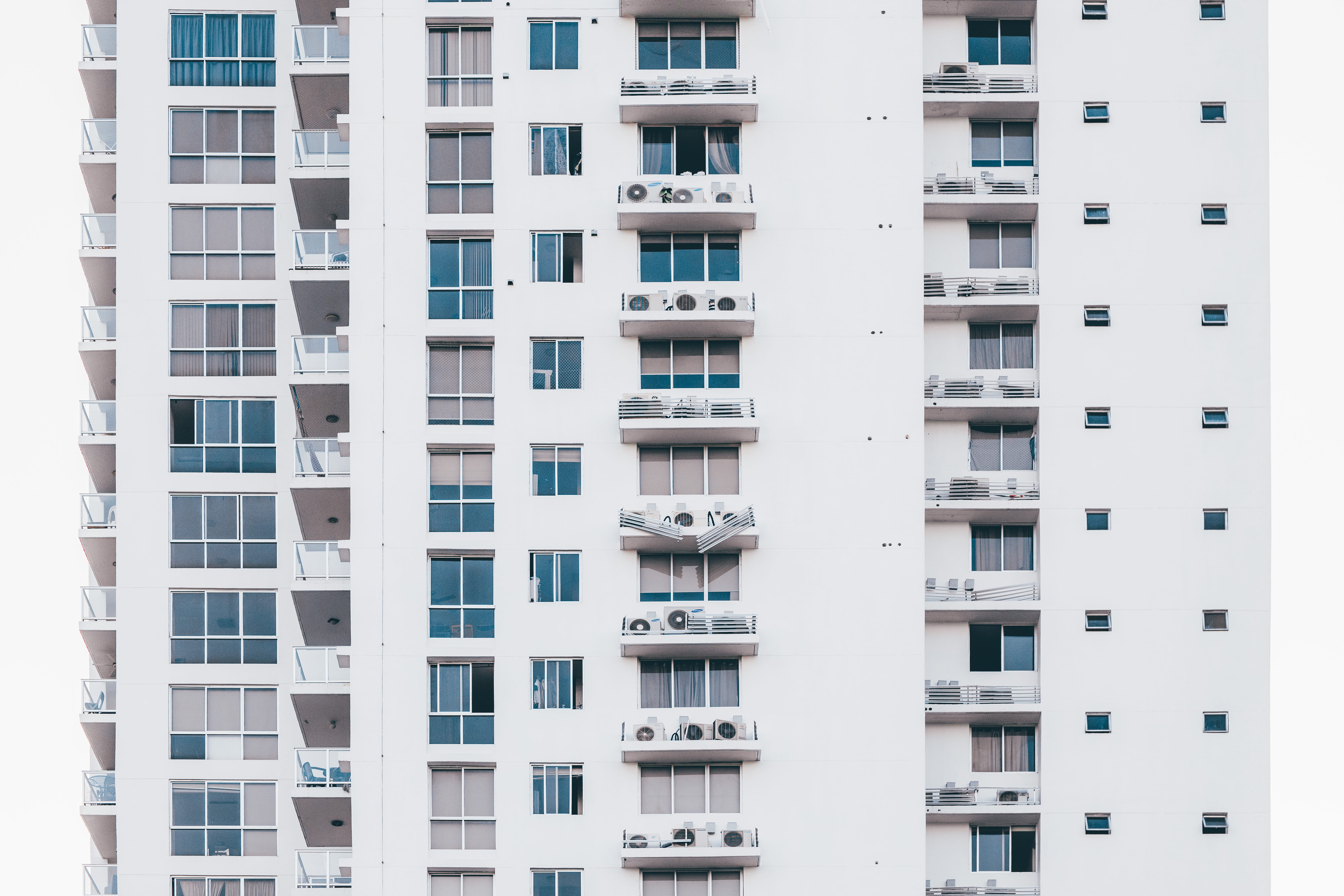 Minimalist Photography of White and Gray Condominium, apartments