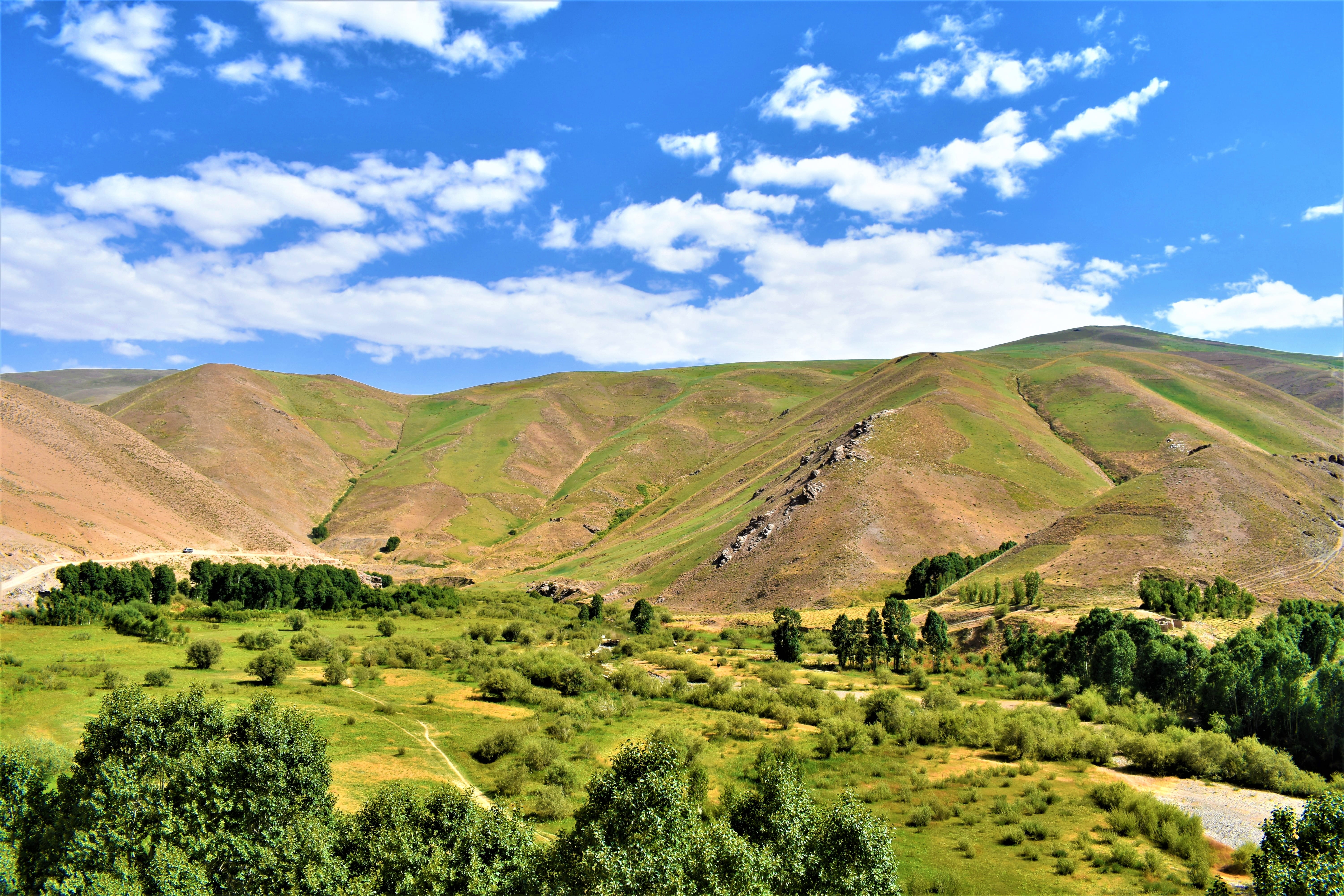 Brown and Green Mountain Range Under Blue Sky, clouds, daylight
