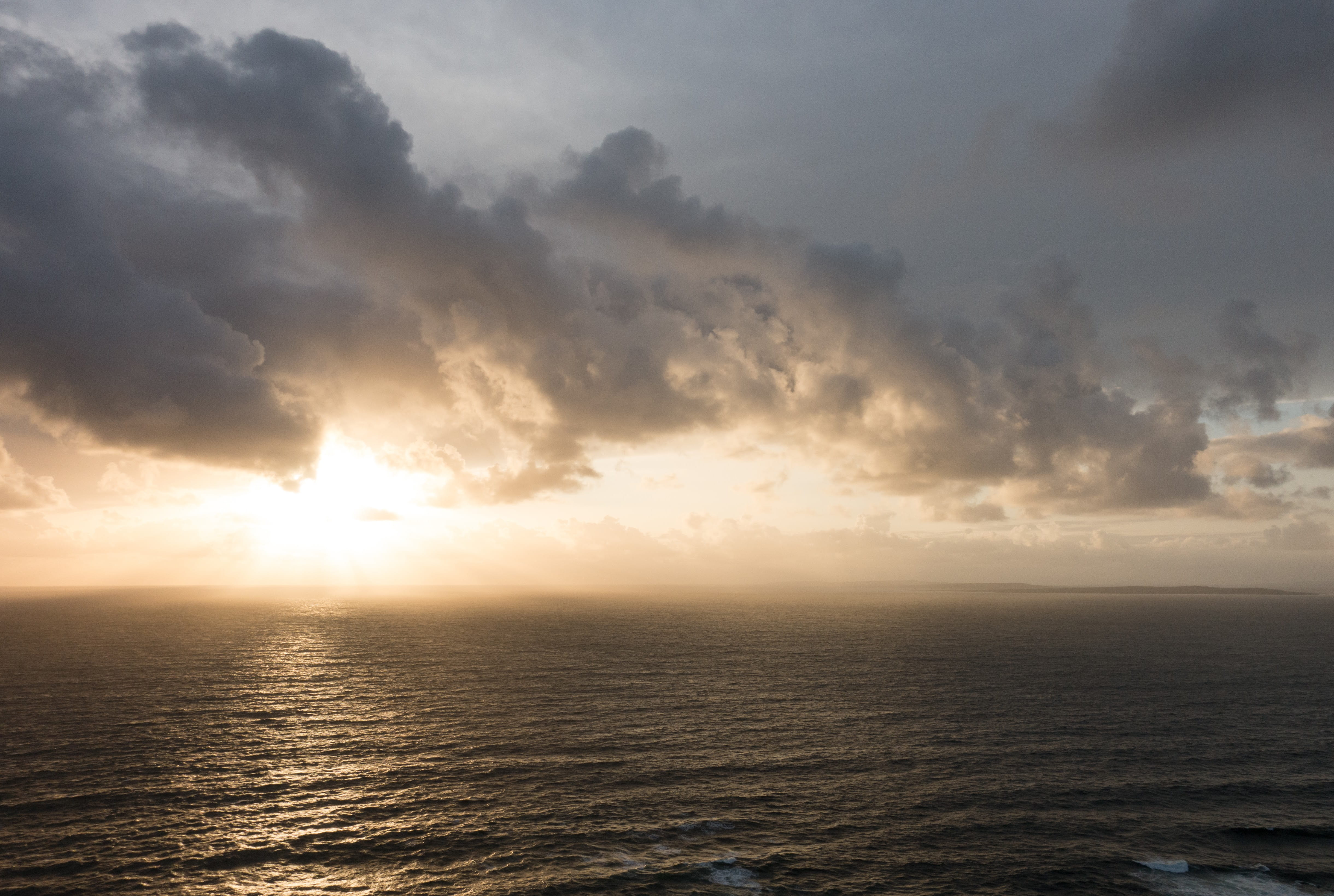 sunset, clouds, water, waves, cliffs, shore, explosion, rays