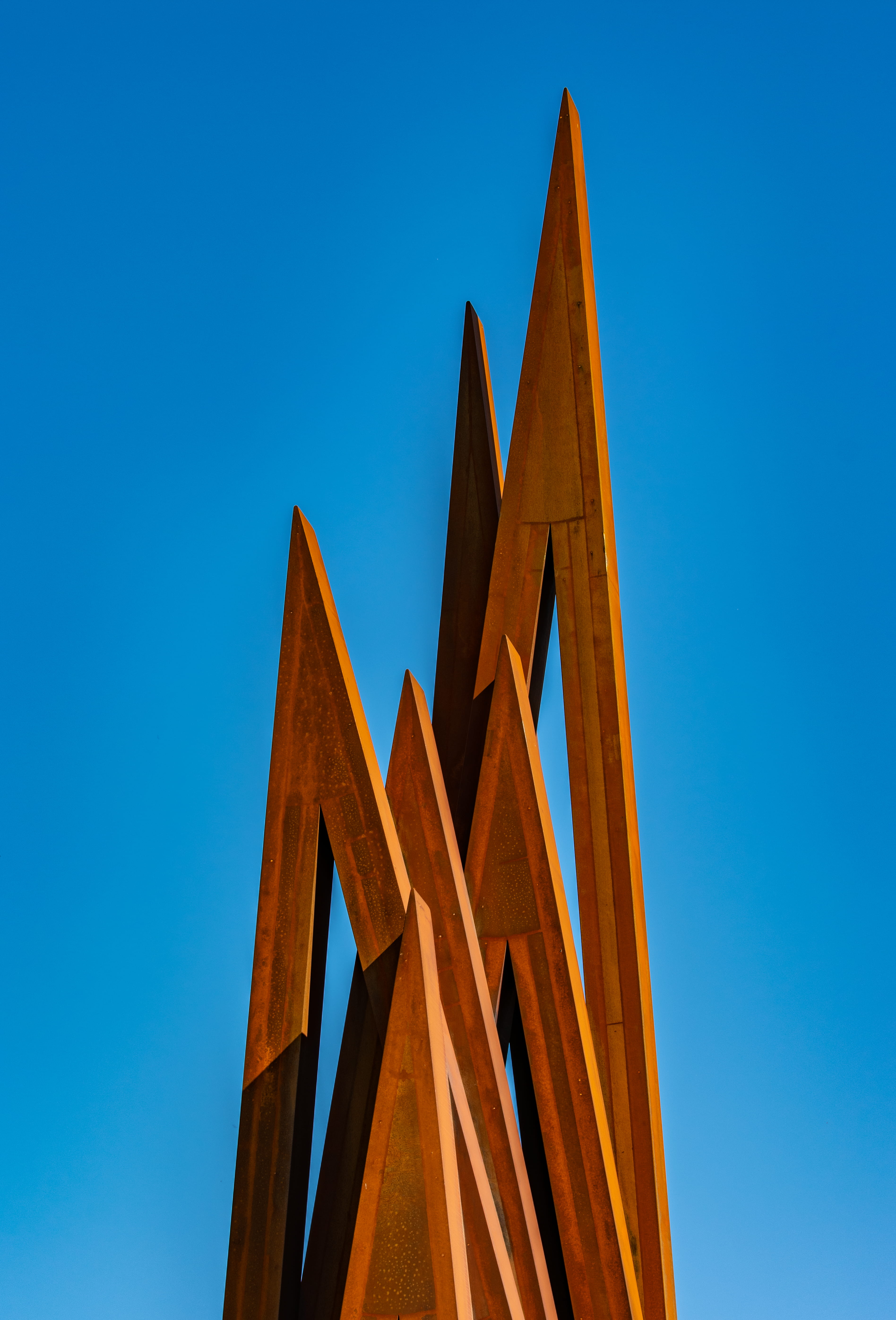 wooden brown triangular tool, blue, sky, built structure, clear sky