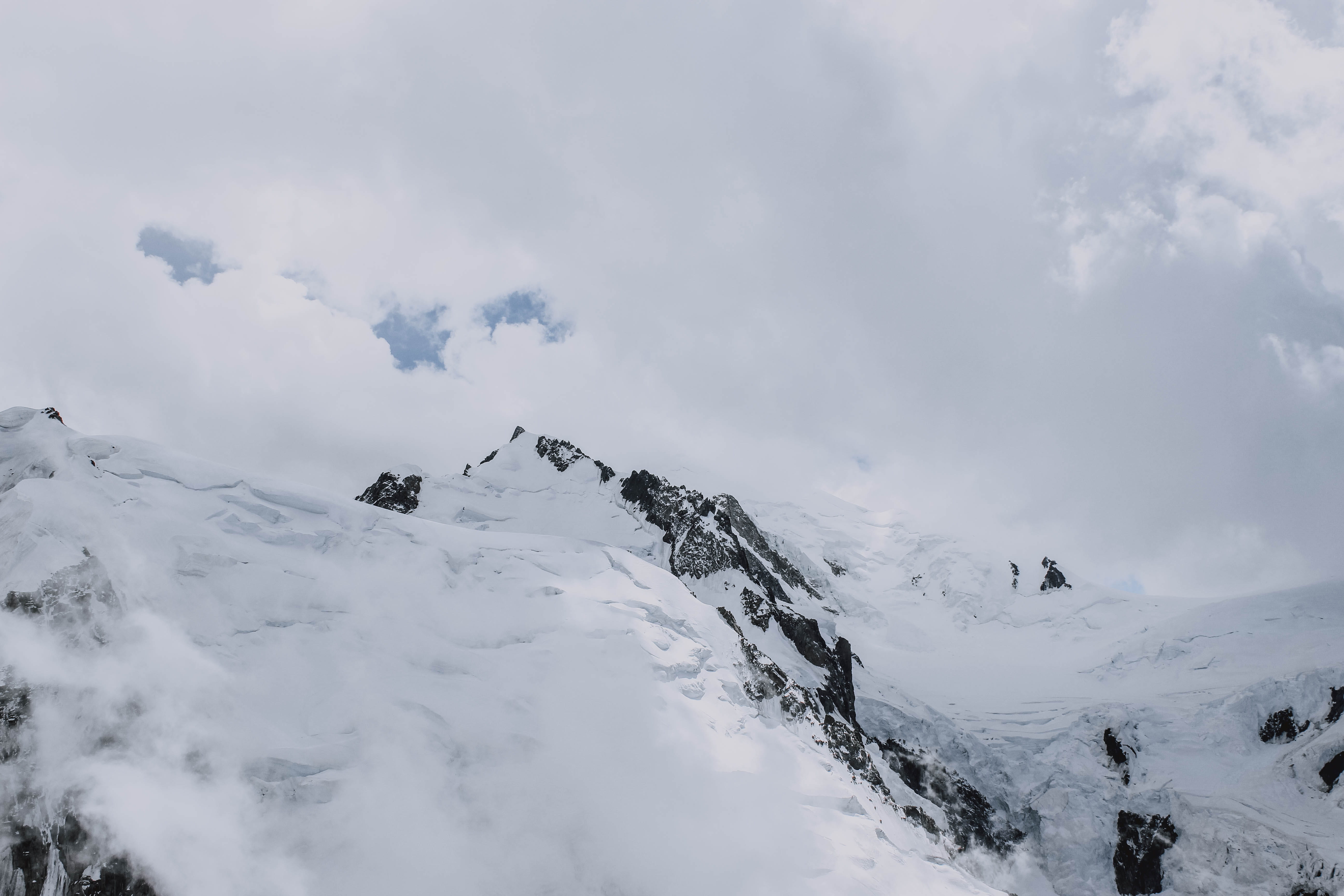 white snow on mountain during daytime, cold temperature, winter