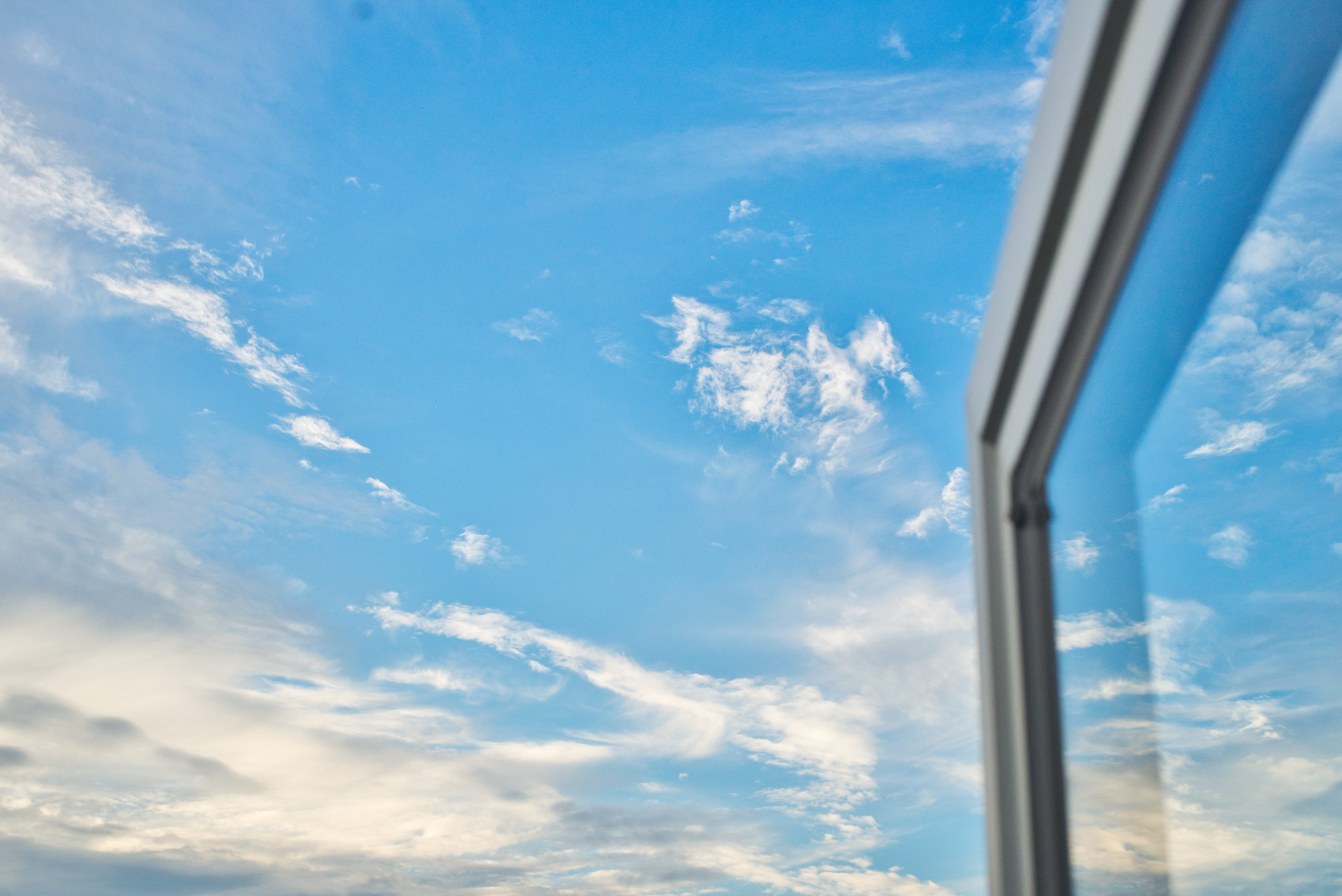 sky, blue, window, cloud - sky, day, low angle view, nature