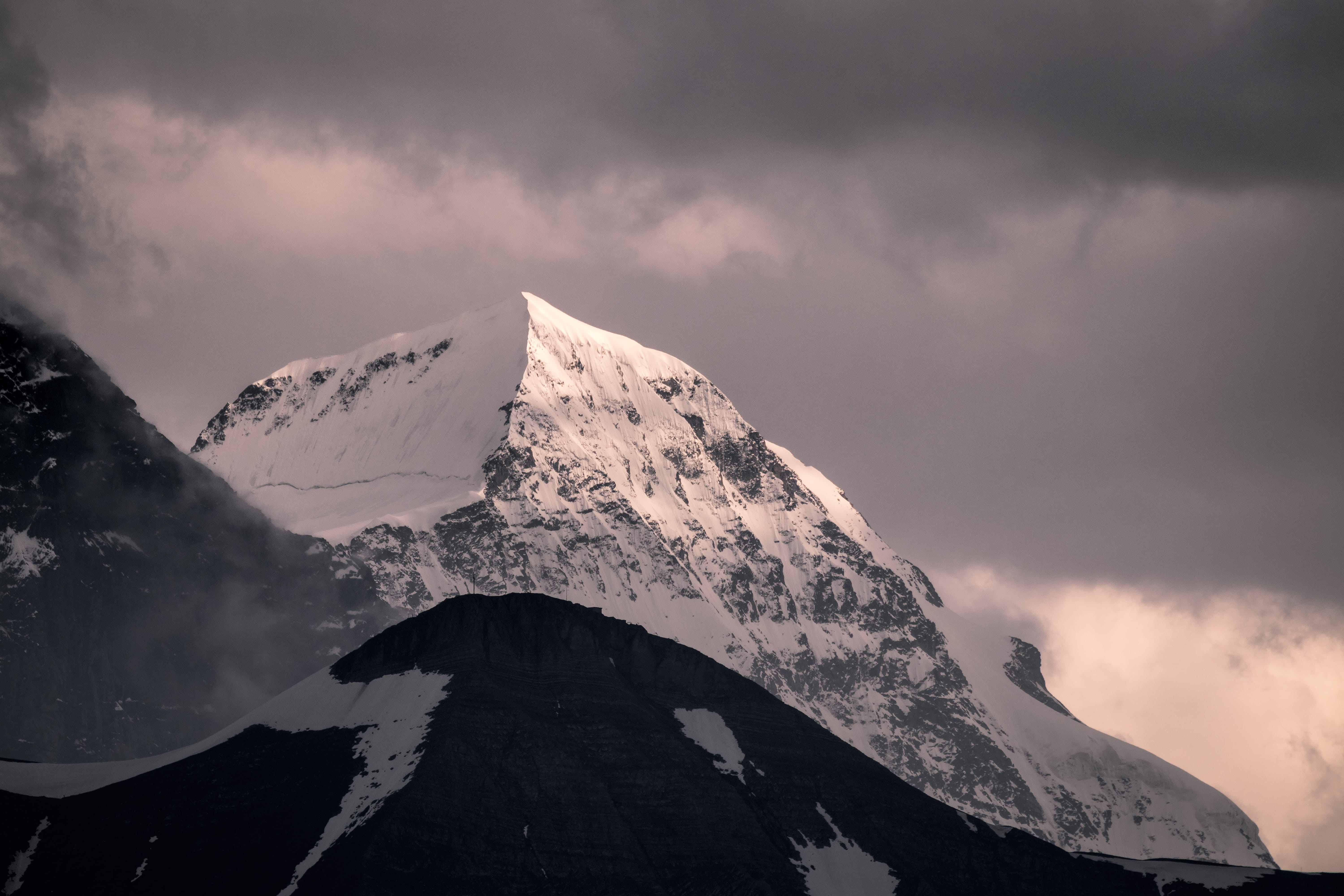 mountain covered by snow under white clouds at daytime, sky, cloudscape
