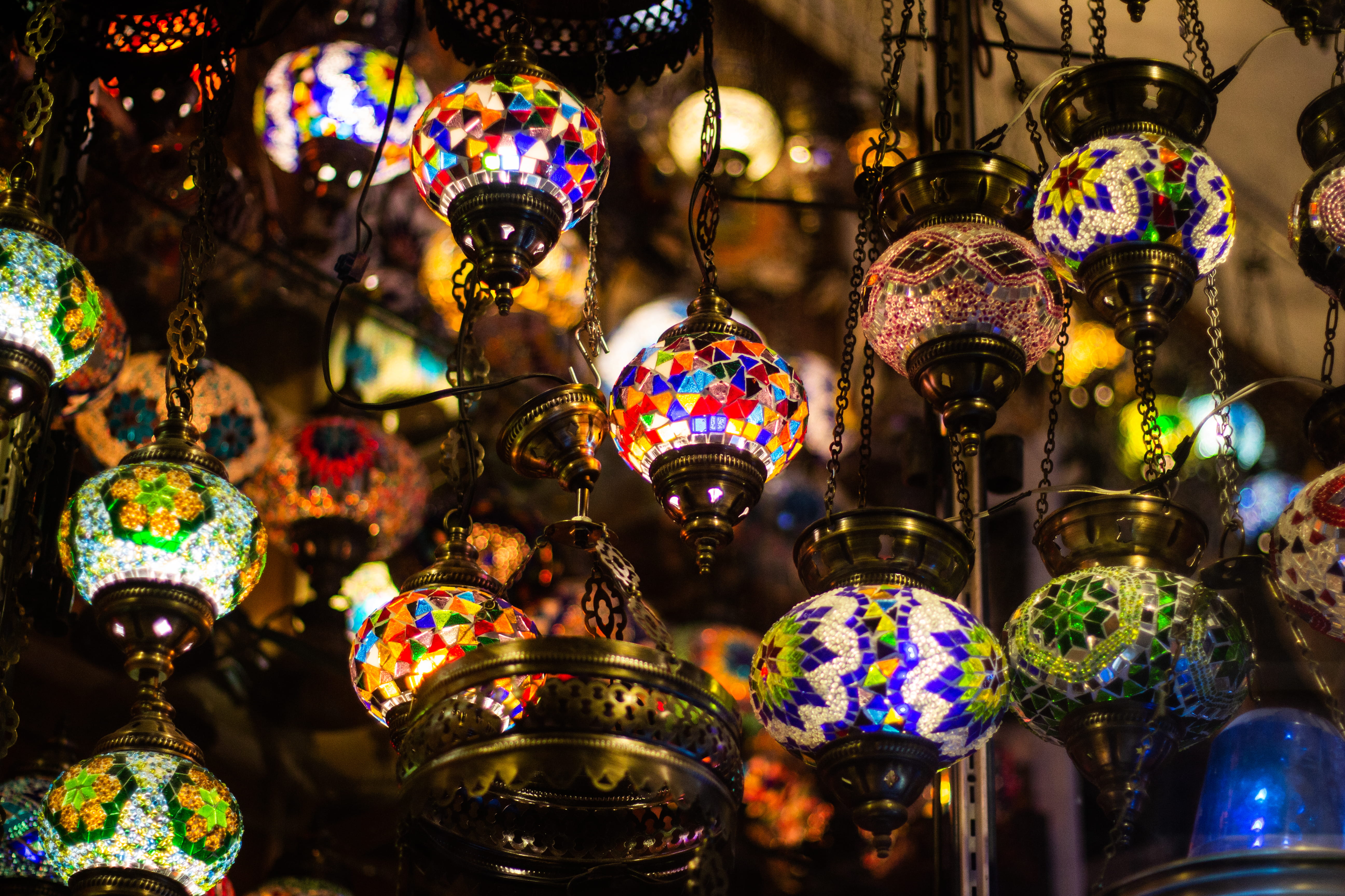assorted light-up hanging lamps, large group of objects, multi colored