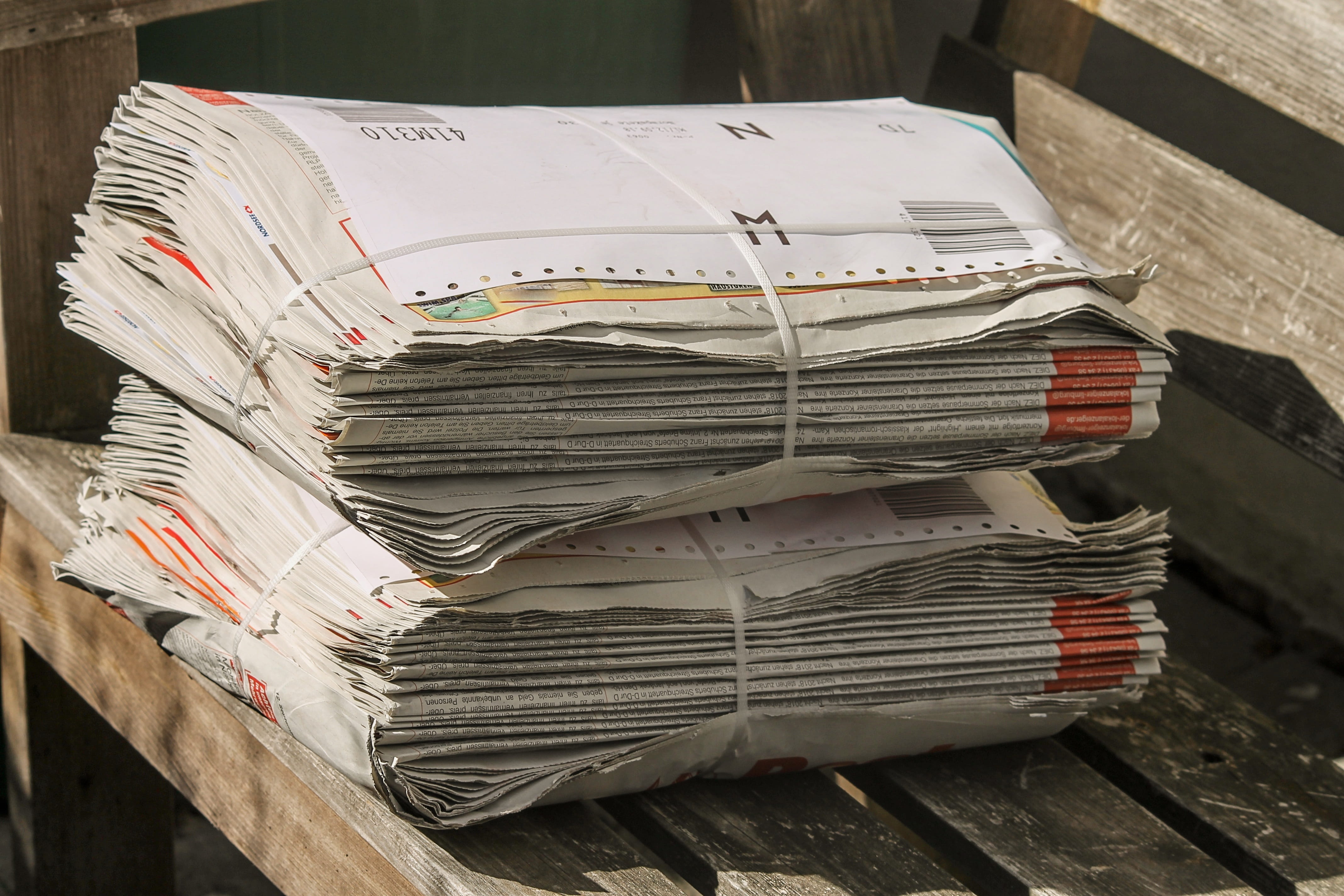 newspapers, stack, bundle, shipping, paper stack, pressure