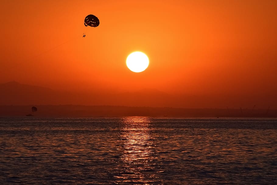 sunset, sea, sky, dusk, evening, seascape, nature, parachute HD wallpaper