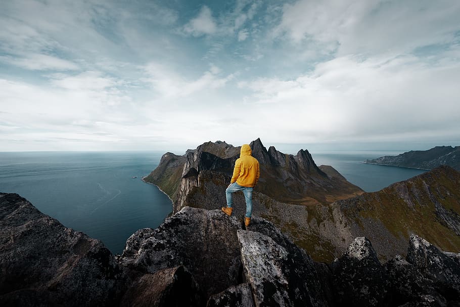man standing on mountain peak, rock, rock - object, solid, sky HD wallpaper