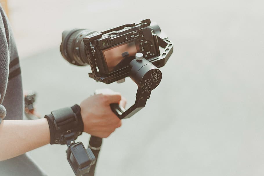 Person Holding Black Dslr Camera, action, camera equipment, camera lens HD wallpaper