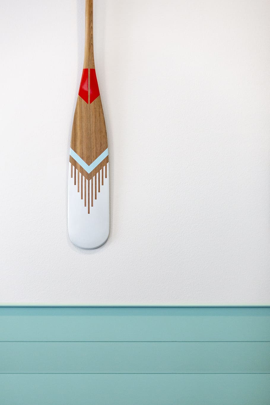 brown, teal, and gray wooden paddle on gray wall, oar, tribal, HD wallpaper