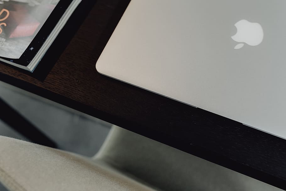 Stylish workspace with MacBook computer on home or studio, tech HD wallpaper