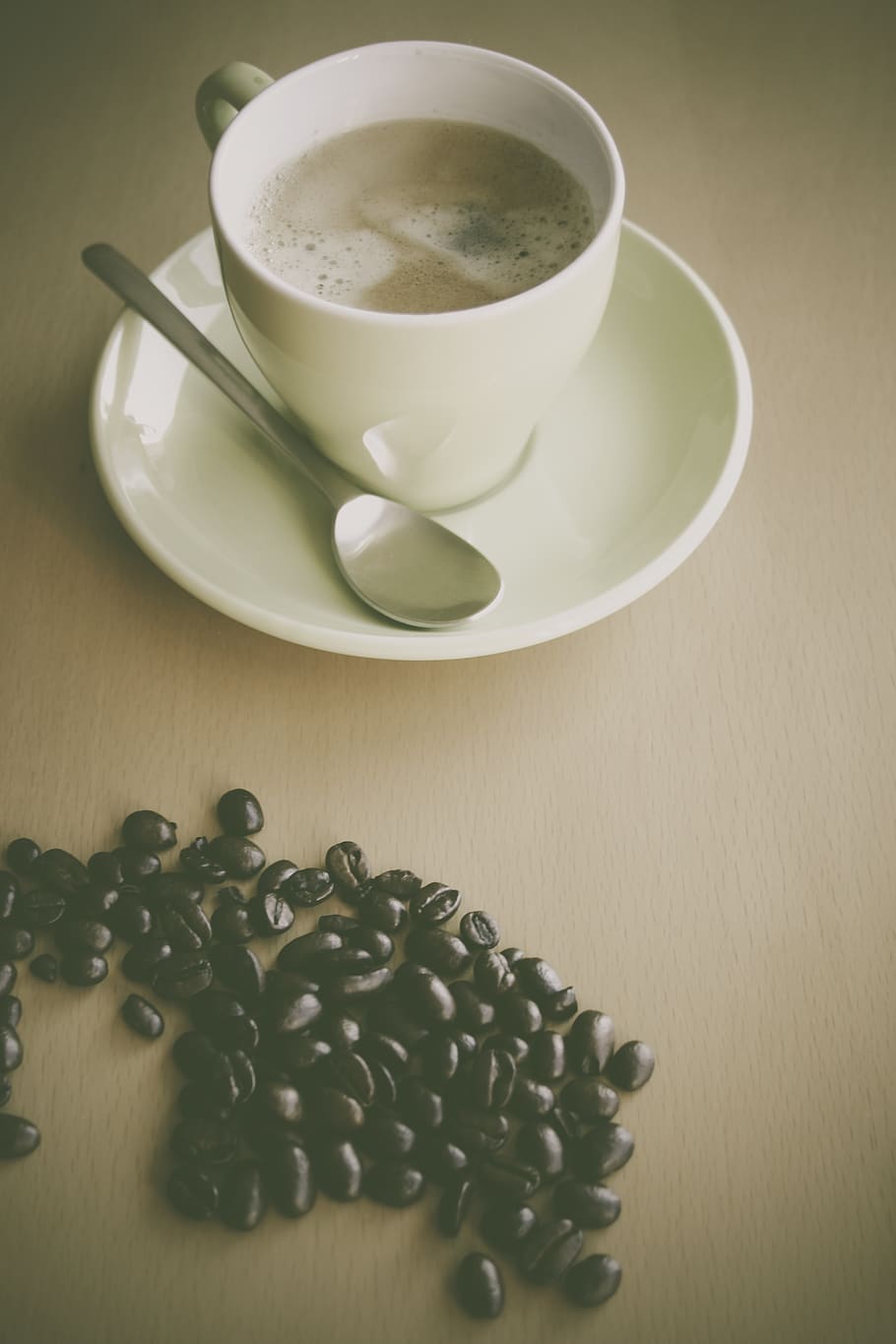 White Ceramic Coffee Mug Beside Silver Teaspoon on White Ceramic Plate HD wallpaper