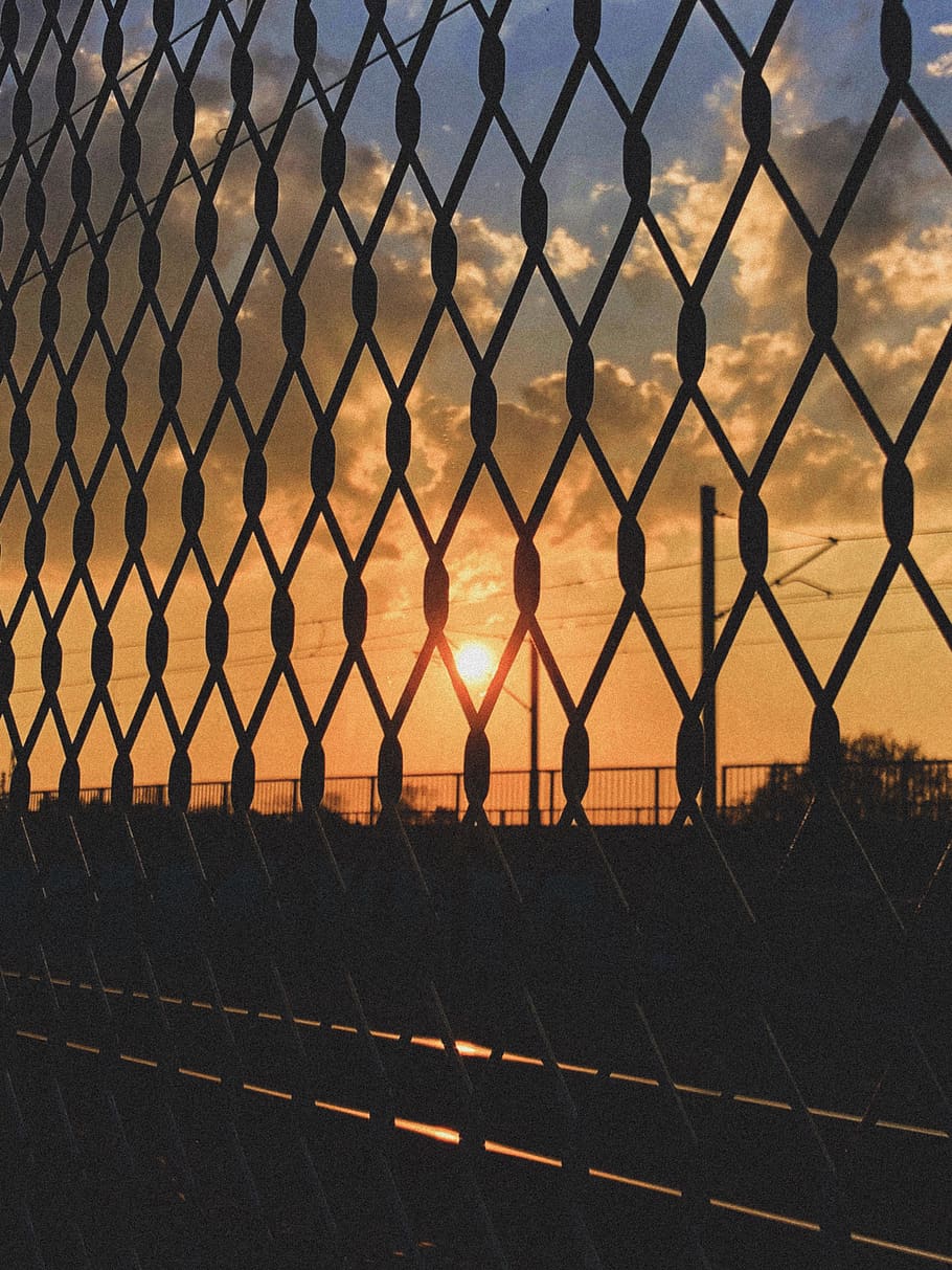 fence, linked fence, tracks, railtracks, sun, sunset, clouds HD wallpaper