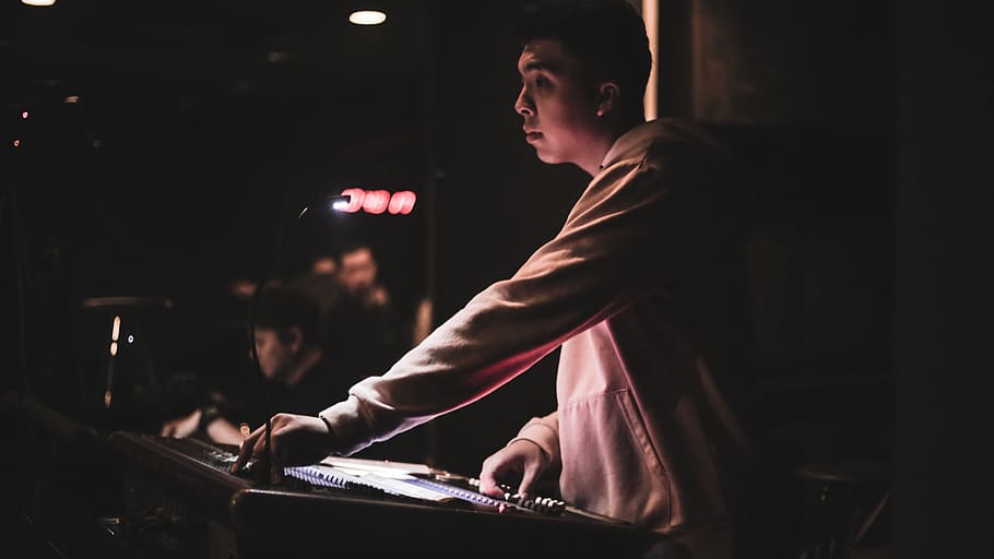 man playing DJ controller, human, person, musician, musical instrument HD wallpaper