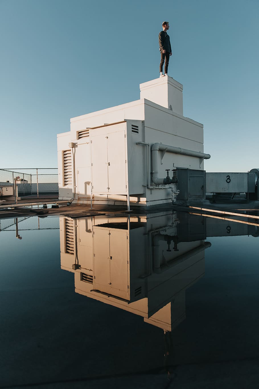 man standing at rooftop, water, architecture, sky, clear sky HD wallpaper