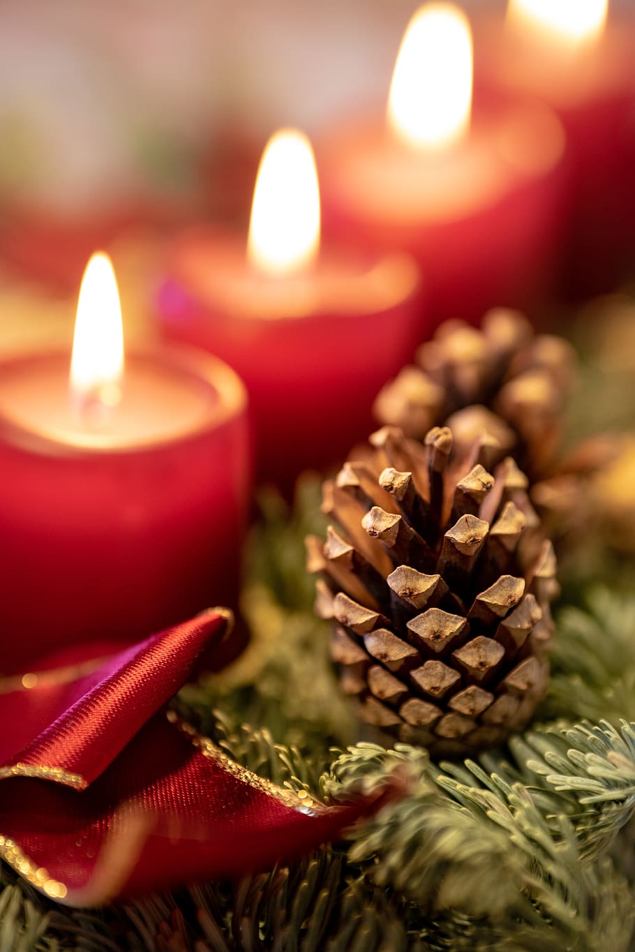 brown pinecone, candle, celebration, burning, fire, flame, illuminated HD wallpaper