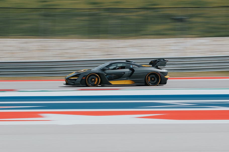 black and yellow sports car speeding on track, vehicle, automobile
