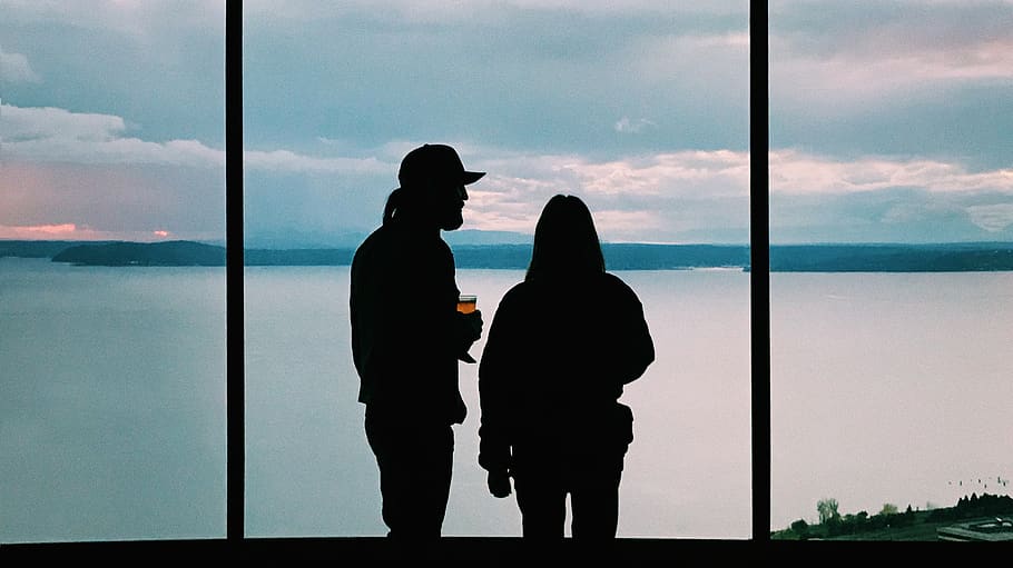 silhouette of two person standing near body of water, human, couple