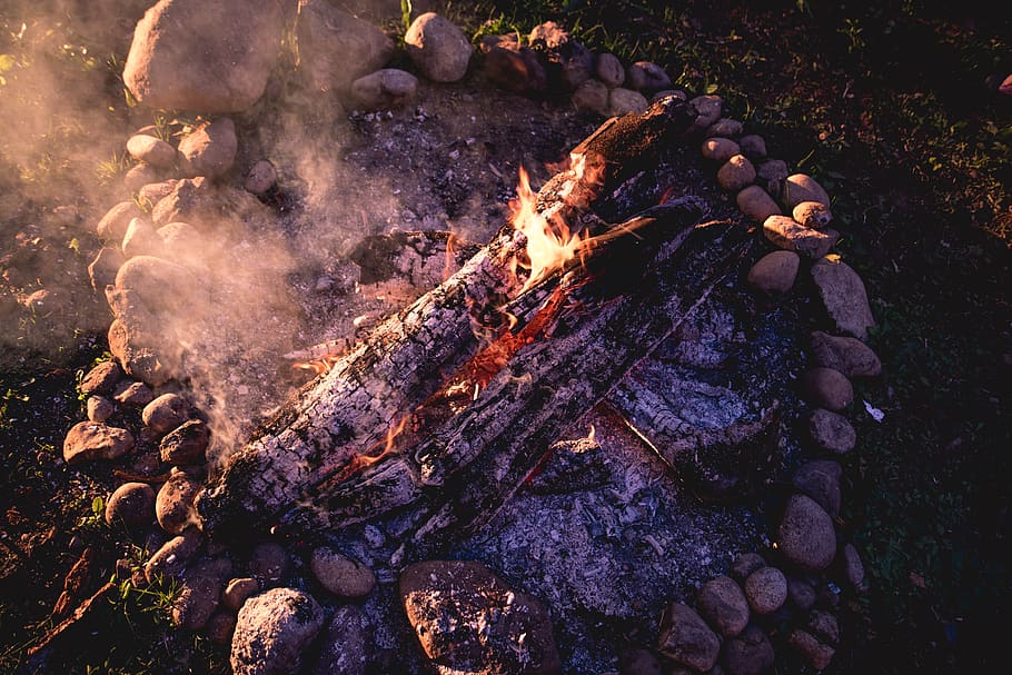 fire, logs, sunset, bonfire, light, colors, vibrant, burning HD wallpaper