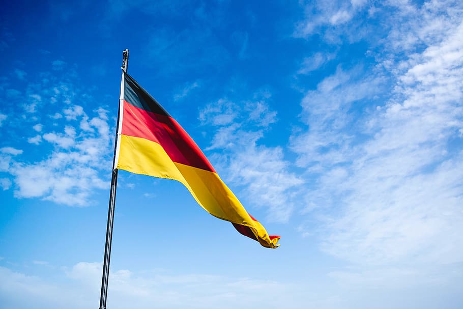 blue, red, and yellow flag, sky, low angle view, cloud - sky HD wallpaper