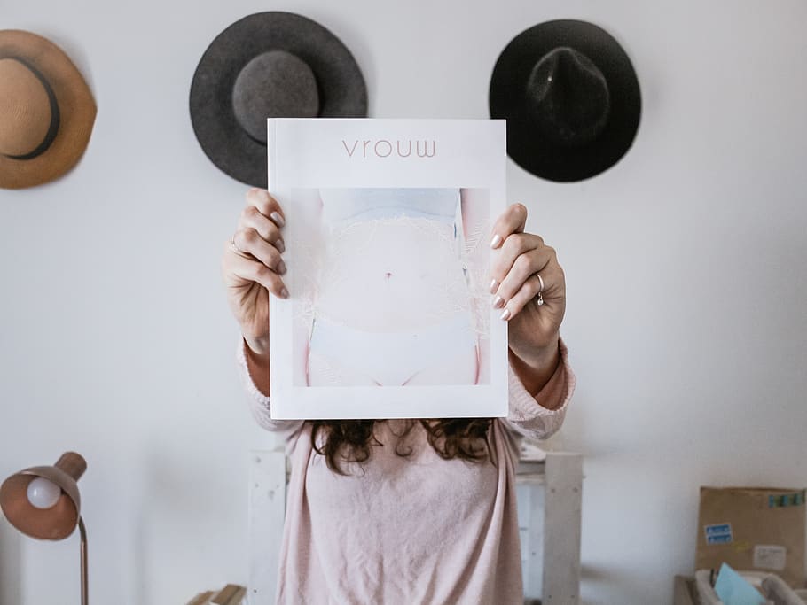 person holding frame, one person, front view, indoors, obscured face HD wallpaper
