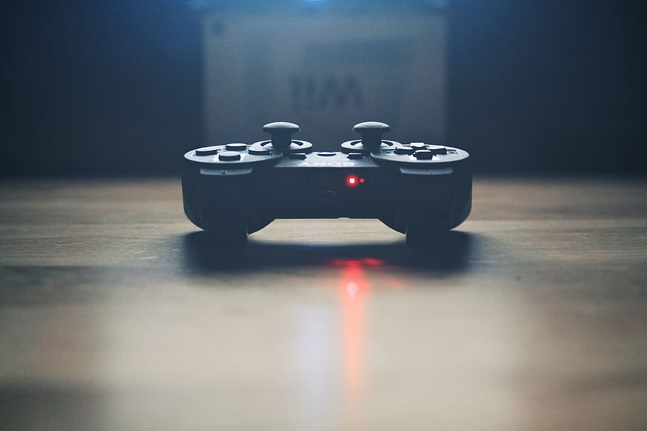 turned on wireless dualshock game controller, indoors, table HD wallpaper