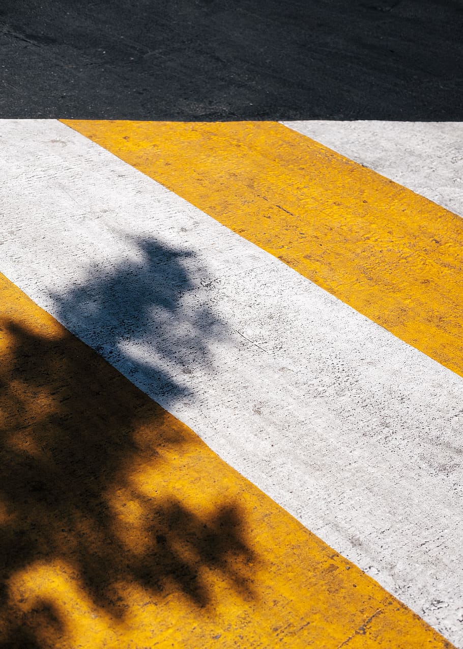 pedestrian, lane, shadow, white, yellow, paint, street, road HD wallpaper