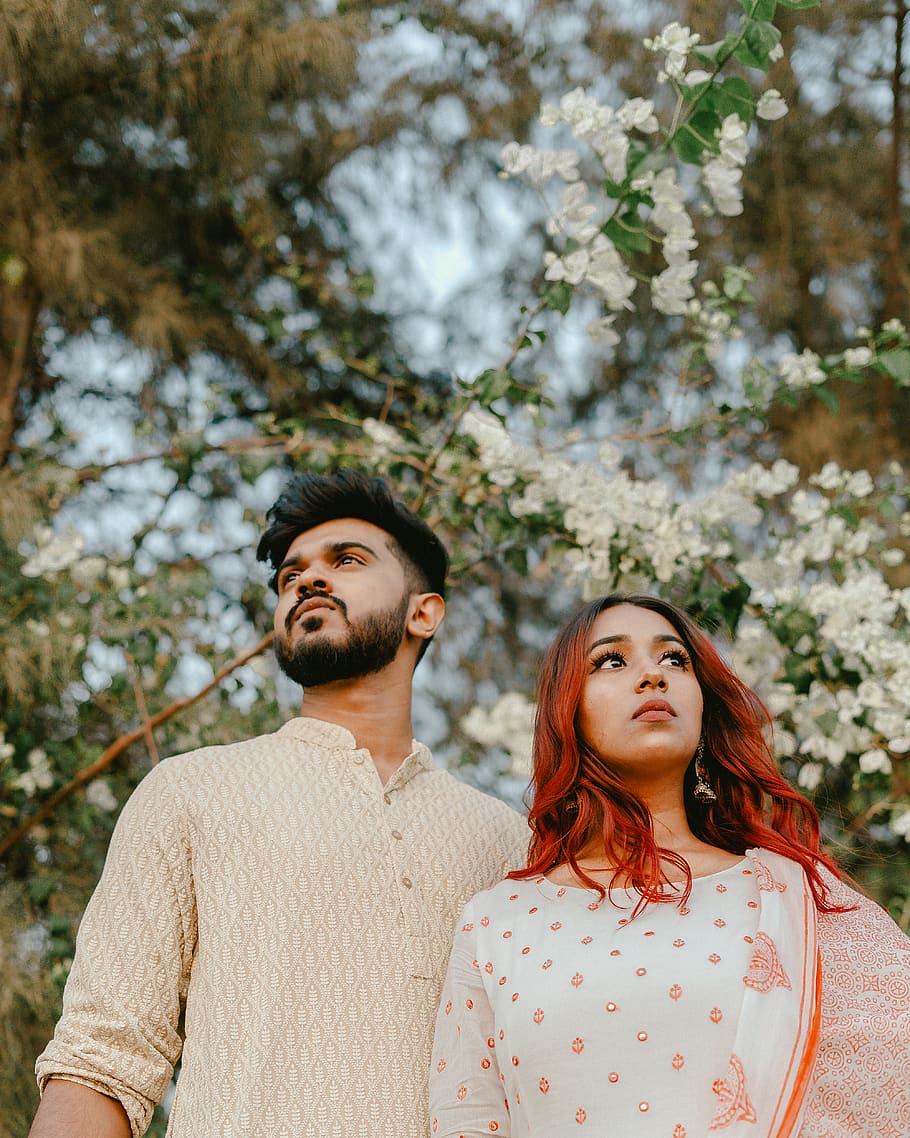couple standing near tree, apparel, clothing, person, human, sleeve HD wallpaper