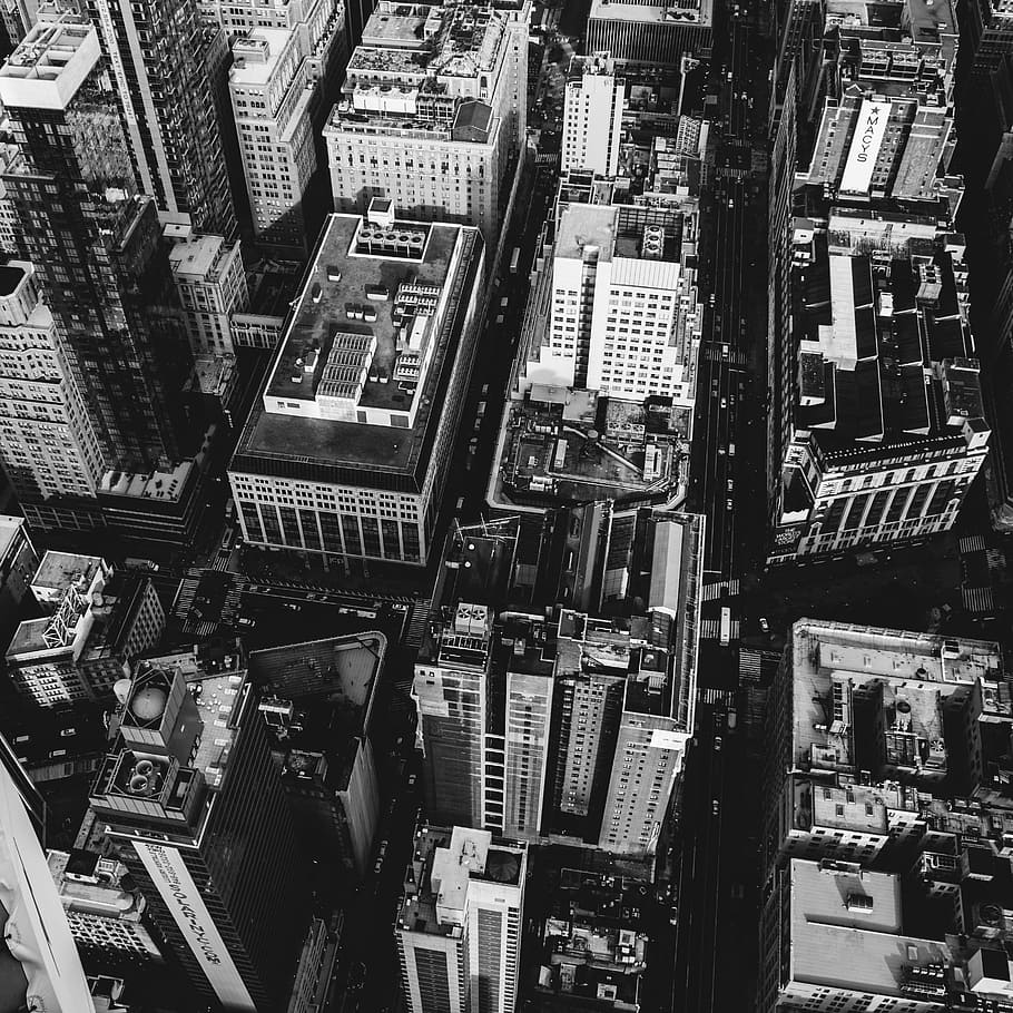 grayscale and bird's-eye view photography of city buildings, rooftop