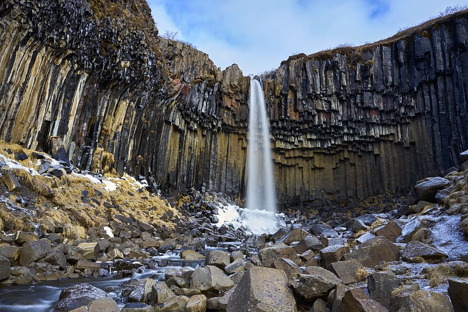 waterfall surrounded by rocks, iceland, cliff, svartifoss trail HD wallpaper