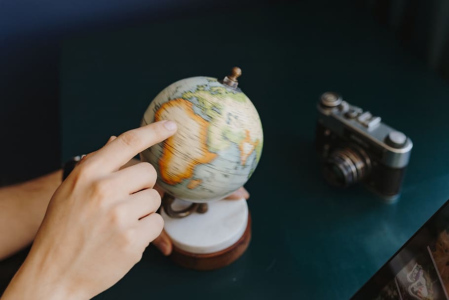 Male Finger Showing A Part Of The World On An Globe, geography, HD wallpaper
