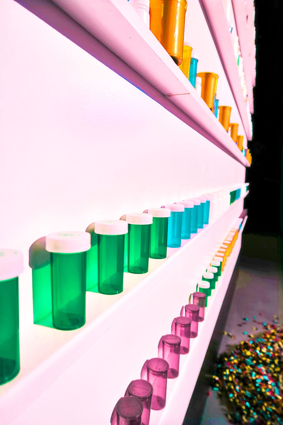 inline assorted-color bottles, in a row, multi colored, indoors HD wallpaper