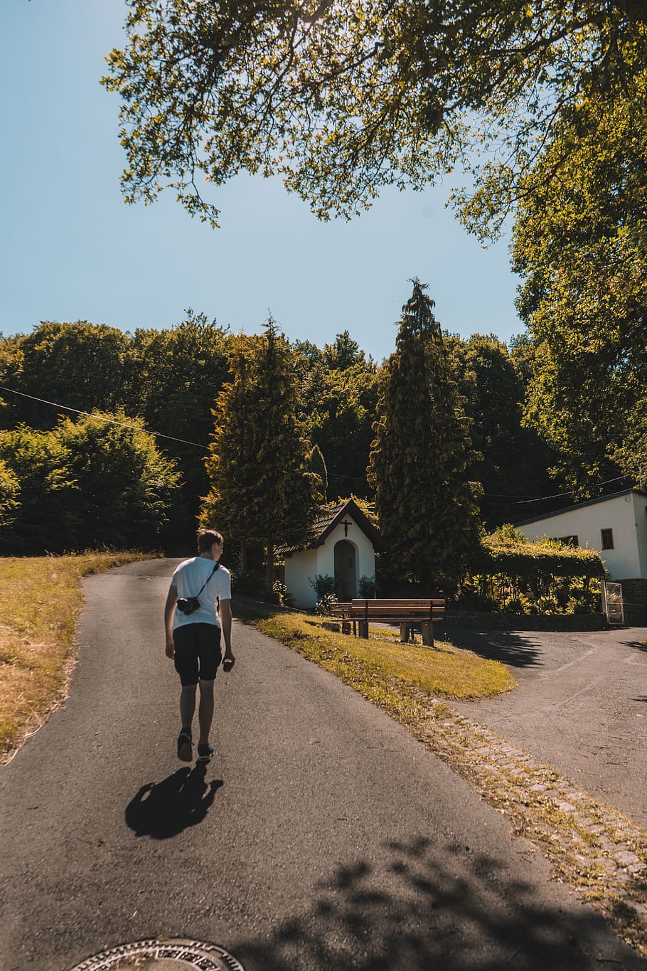 Along the road. A man Walking along the Road.