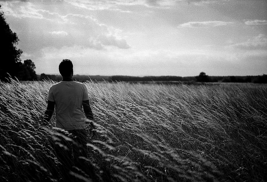lonely, field, meadow, black and white, sad, clouds, young guy HD wallpaper