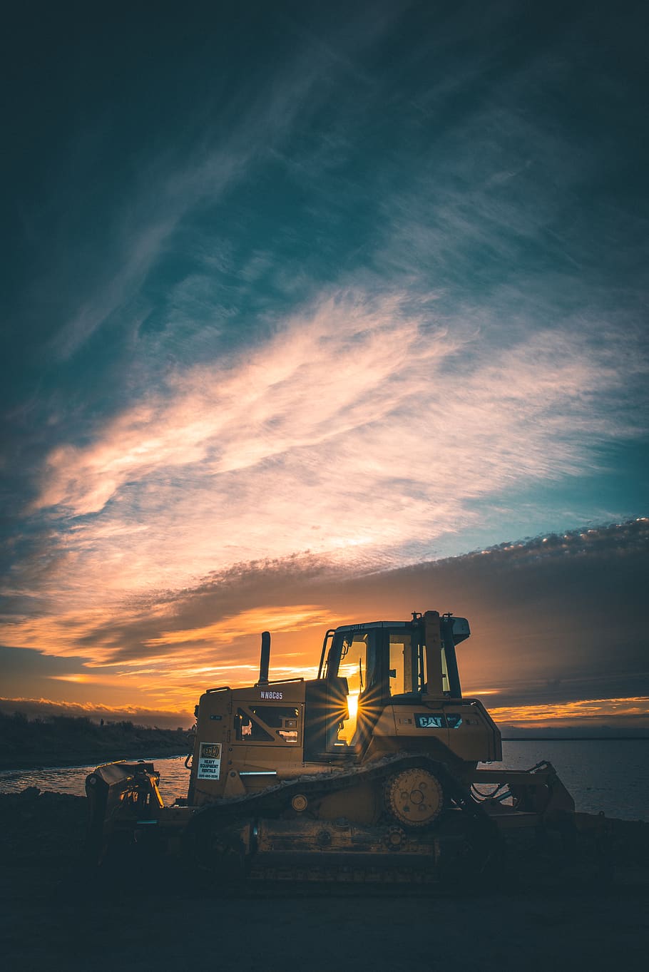 brown front-end loader on dirt near body of water, sky, cloud - sky, HD wallpaper