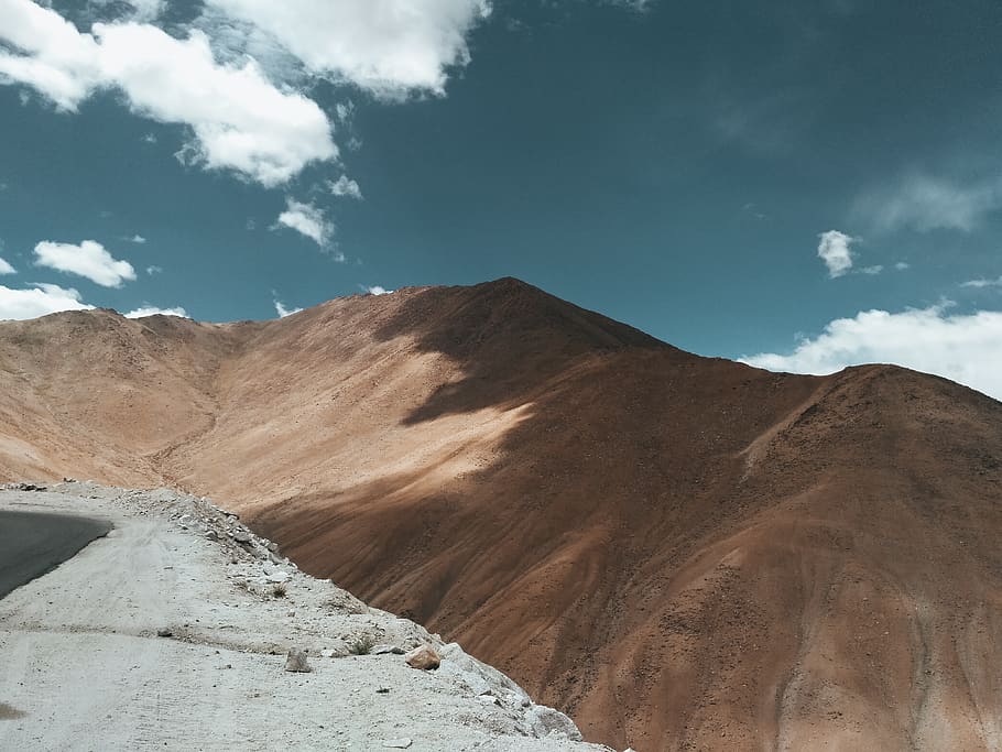 Brown Hill Beside Road, arid, asphalt, barren, clear sky, clouds HD wallpaper