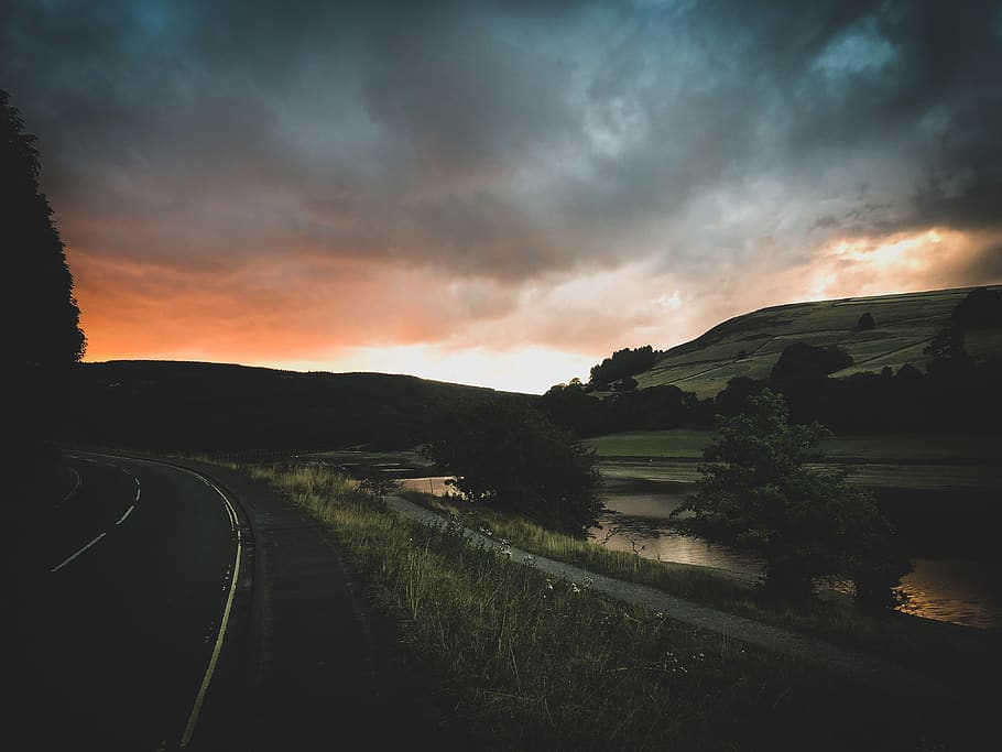 Landscape Photography of Road Beside Body of Water at Golden Hour HD wallpaper