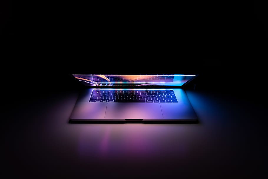 MacBook Pro turned-on on white surface, technology, communication HD wallpaper