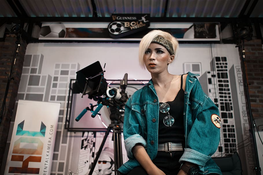 Woman Sitting Near Camera, denim jacket, industry, looking, make-up HD wallpaper