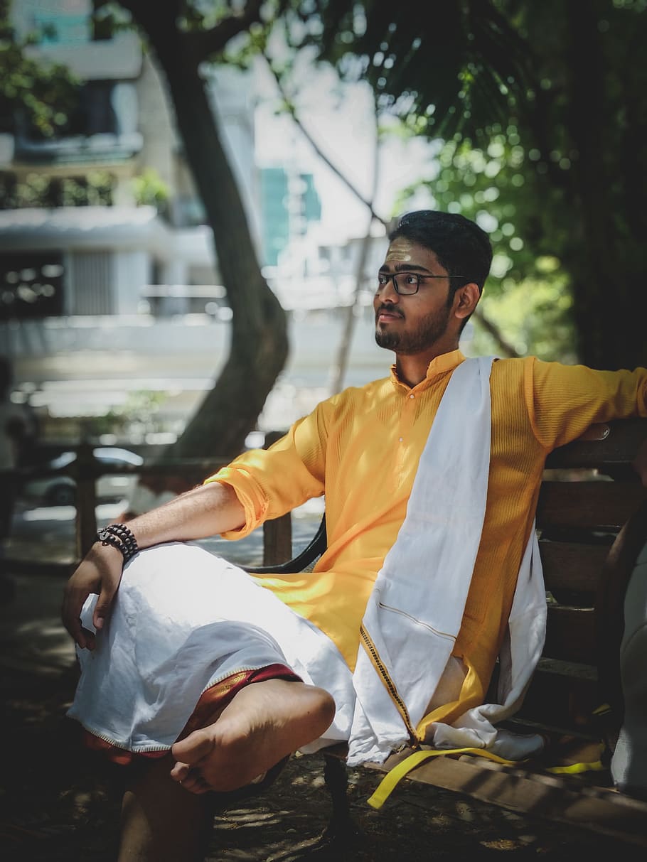 Man Wearing Yellow and White Suit Sitting on Bench, facial expression HD wallpaper