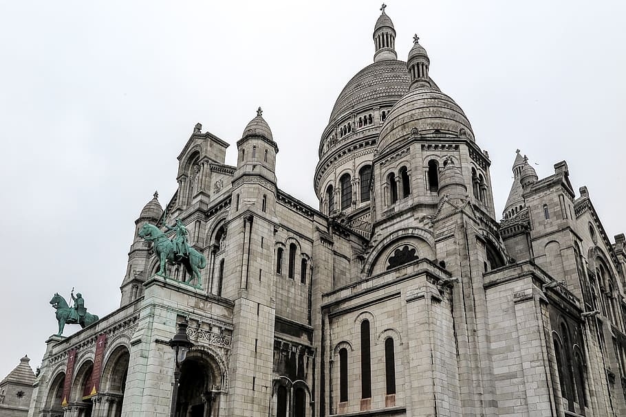 The Sacre Coeur rises from the hilltop in Paris, France., architecture