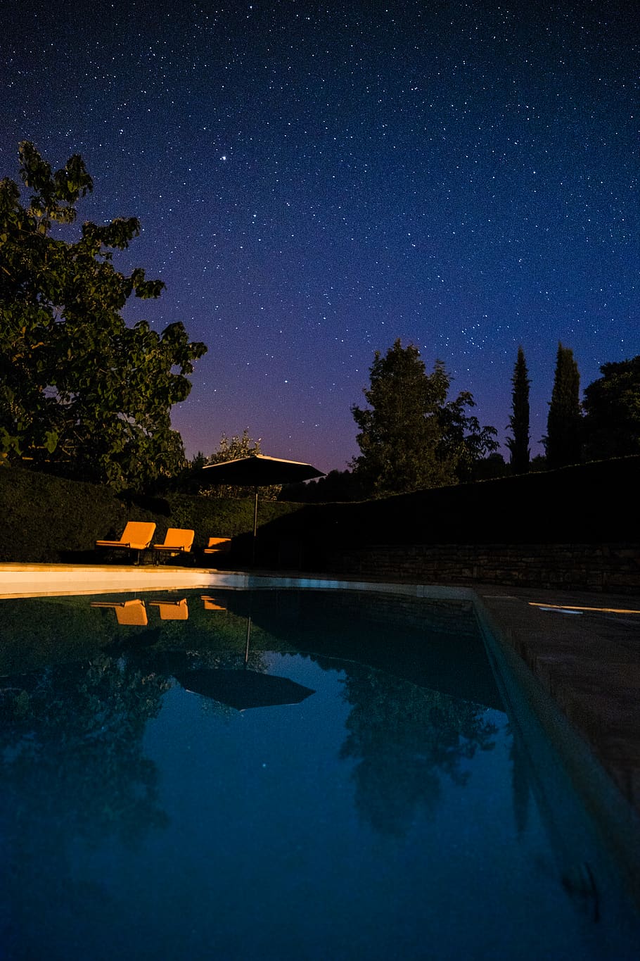 white and brown backyard pool during night time, star - space HD wallpaper