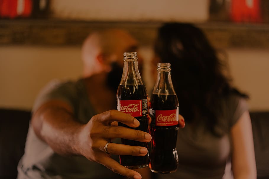 Close-Up Photography of People Holding Coca-Cola Bottles, 4k wallpaper