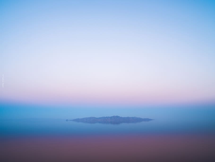 island under clear blue sky, water, sea, horizon, outdoors, nature HD wallpaper