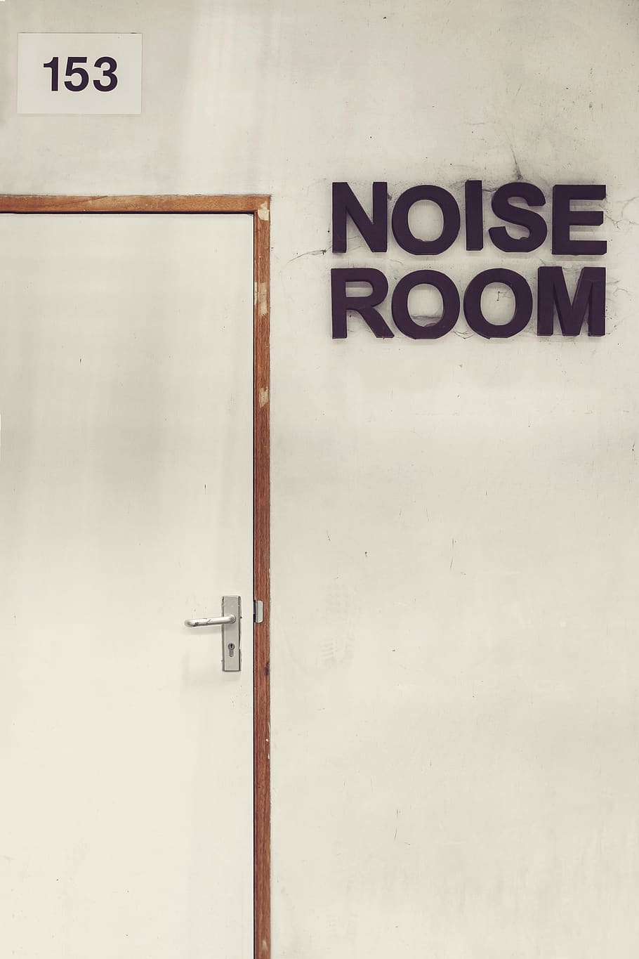 noise room 153, text, door, entrance, communication, western script