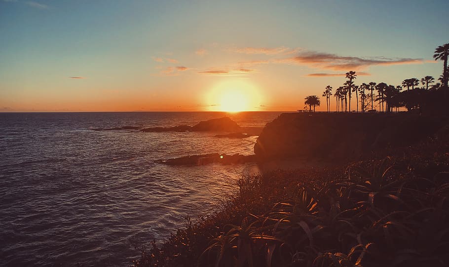 sunset over horizon, sky, water, beauty in nature, scenics - nature HD wallpaper