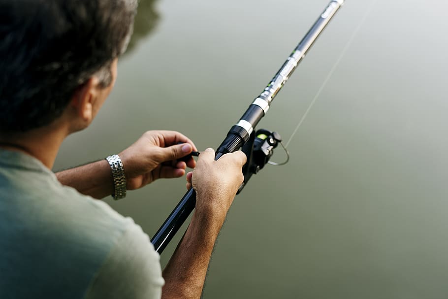 Person Holding Gray and Black Fishing Rod, activity, adventure HD wallpaper