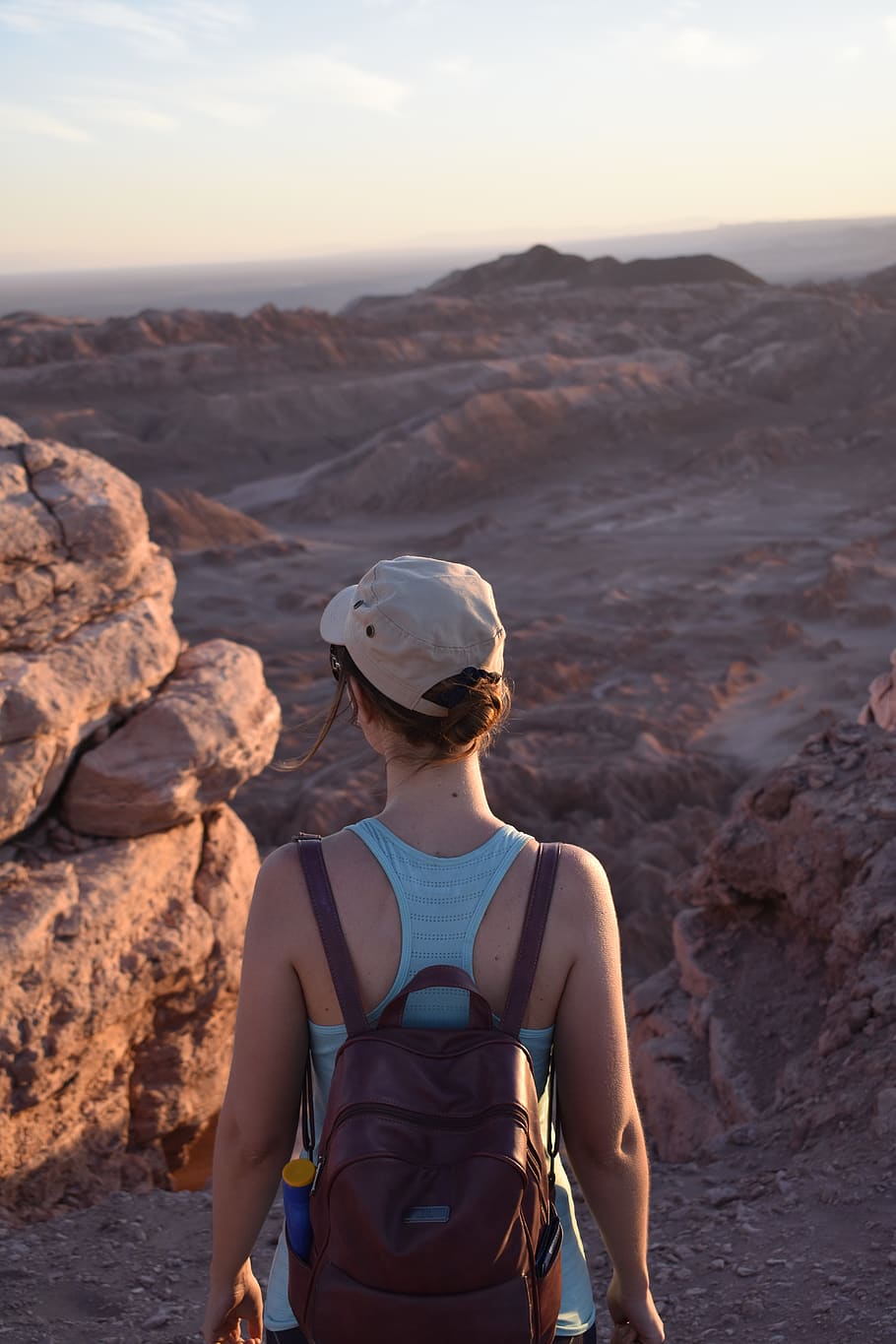 Woman Wearing Black Leather Backpack in Front of Rock, adventure HD wallpaper